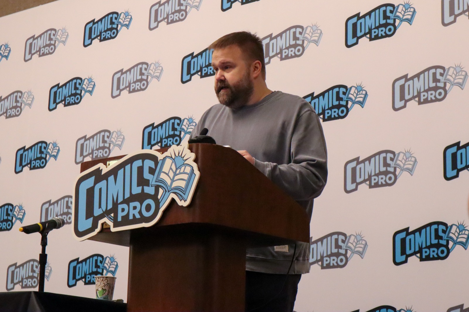 A ComicsPRO member speaking at the Annual Conference podium